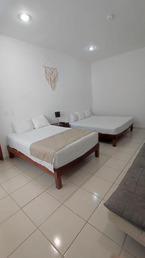 Casa Calendario Azteca Hotel Плая дел Кармен Екстериор снимка